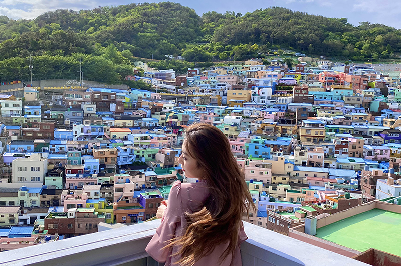 Karen Lee, a fourth-year marketing and organizational management student who studied abroad this spring in South Korea, admires the views of the cultural village in Busan. Photo courtesy of Lee.